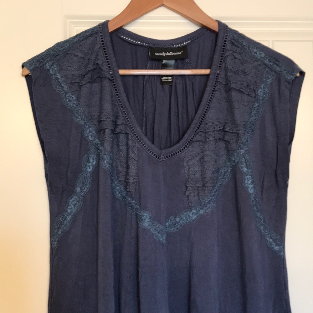 Cap sleeve maternity shirt.